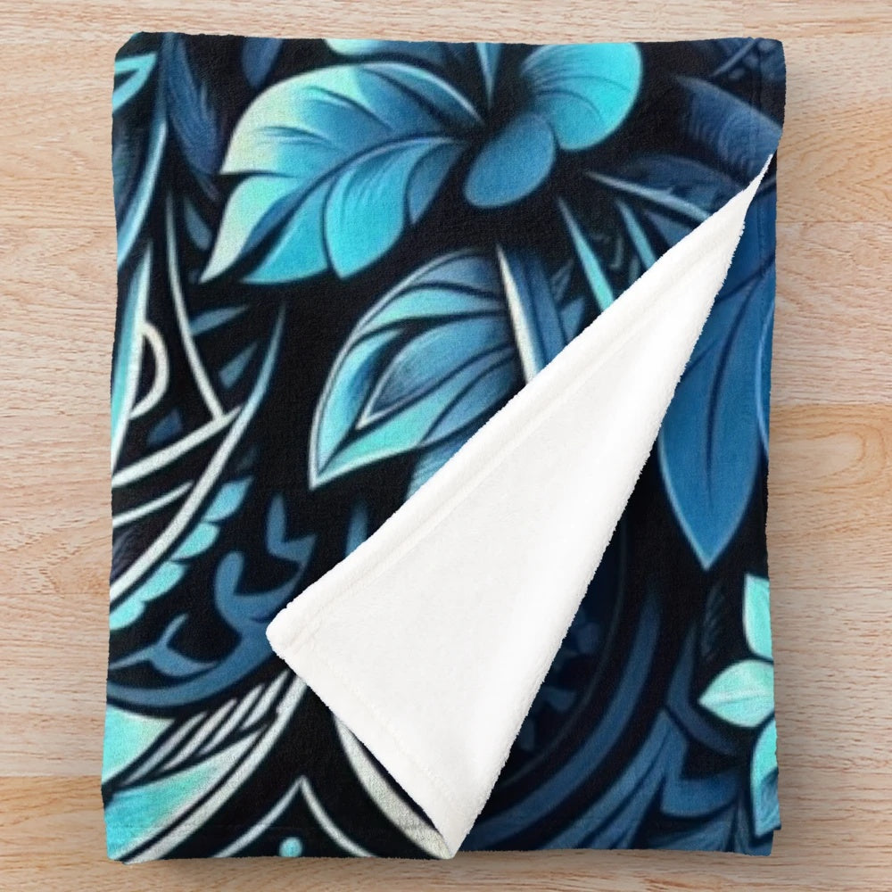 Plush blanket featuring a polynesian-inspired floral and tropical leaf design