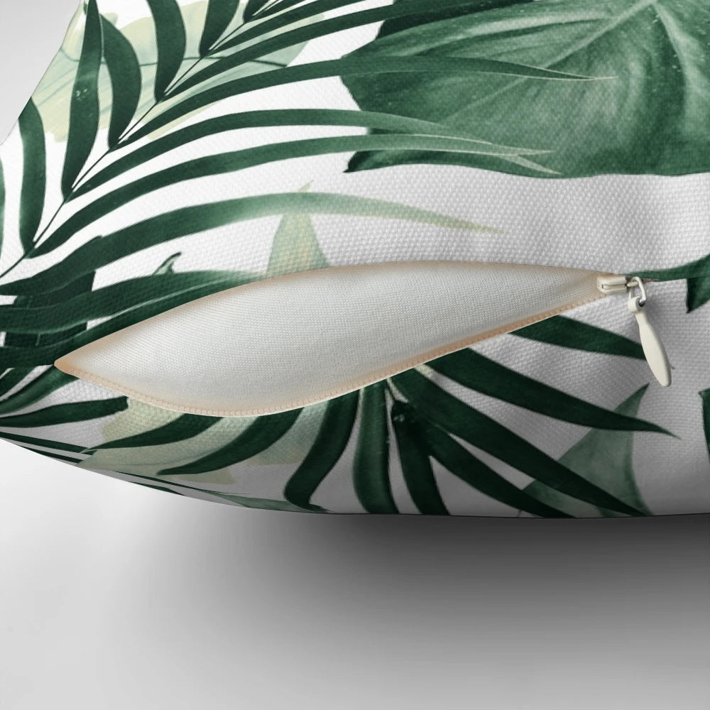 Tropical jungle leaves pattern decorative pillow with lush foliage and botanical designs.