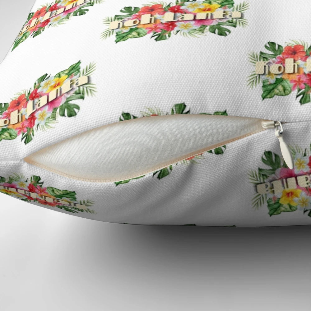 Vibrant tropical flowers in shades of pink, purple, and green adorn this Koh Lanta-inspired throw pillow.