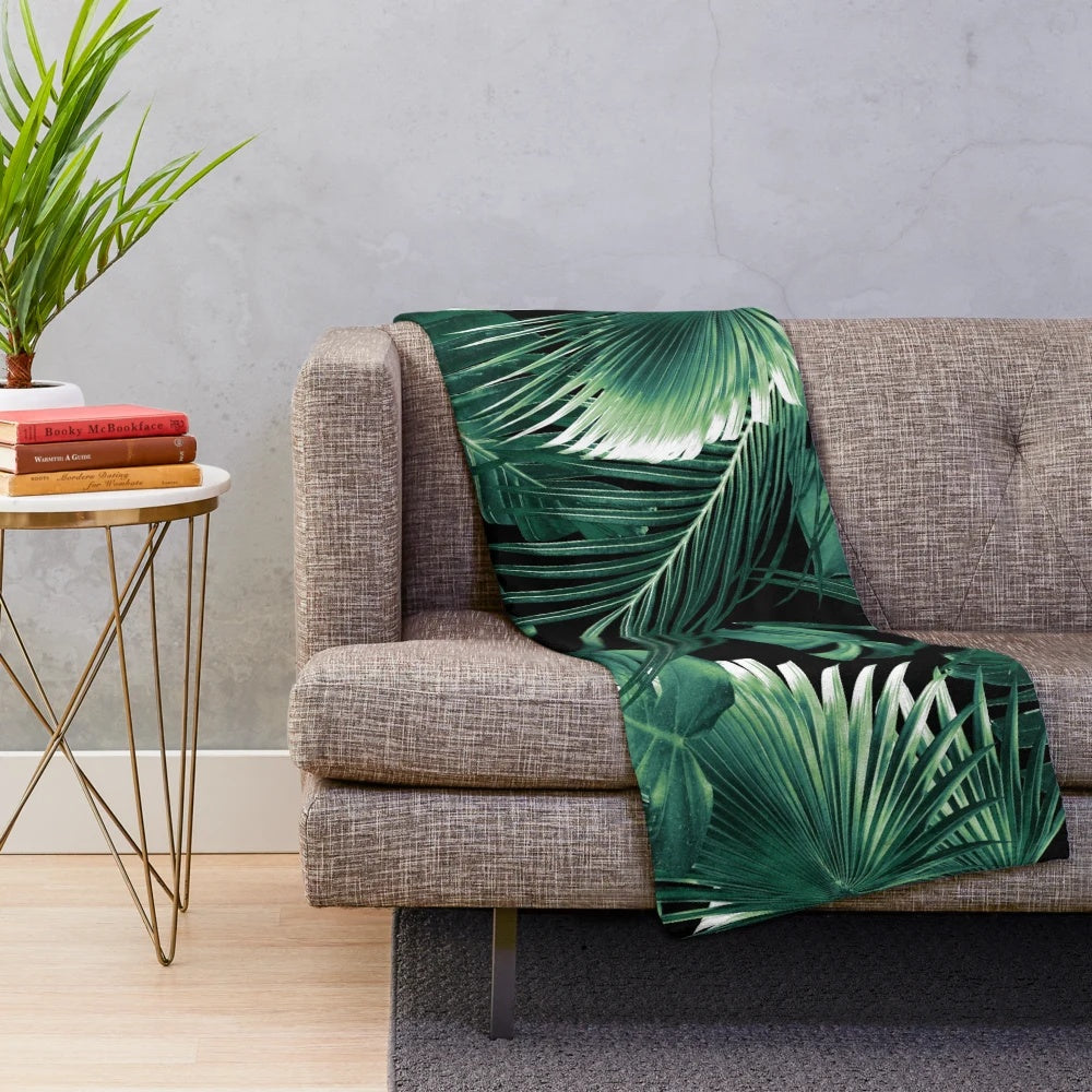 Tropical leaf collage plush blanket featuring vibrant botanical art