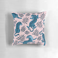 Vibrant tropical leaves and majestic Asian tigers printed on a decorative pillow for a stylish home accent.