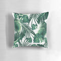 Vibrant tropical leaves collage artwork printed on a soft, high-quality pillow.