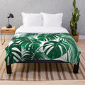 Tropical leaves plush blanket with palm tree leaf design