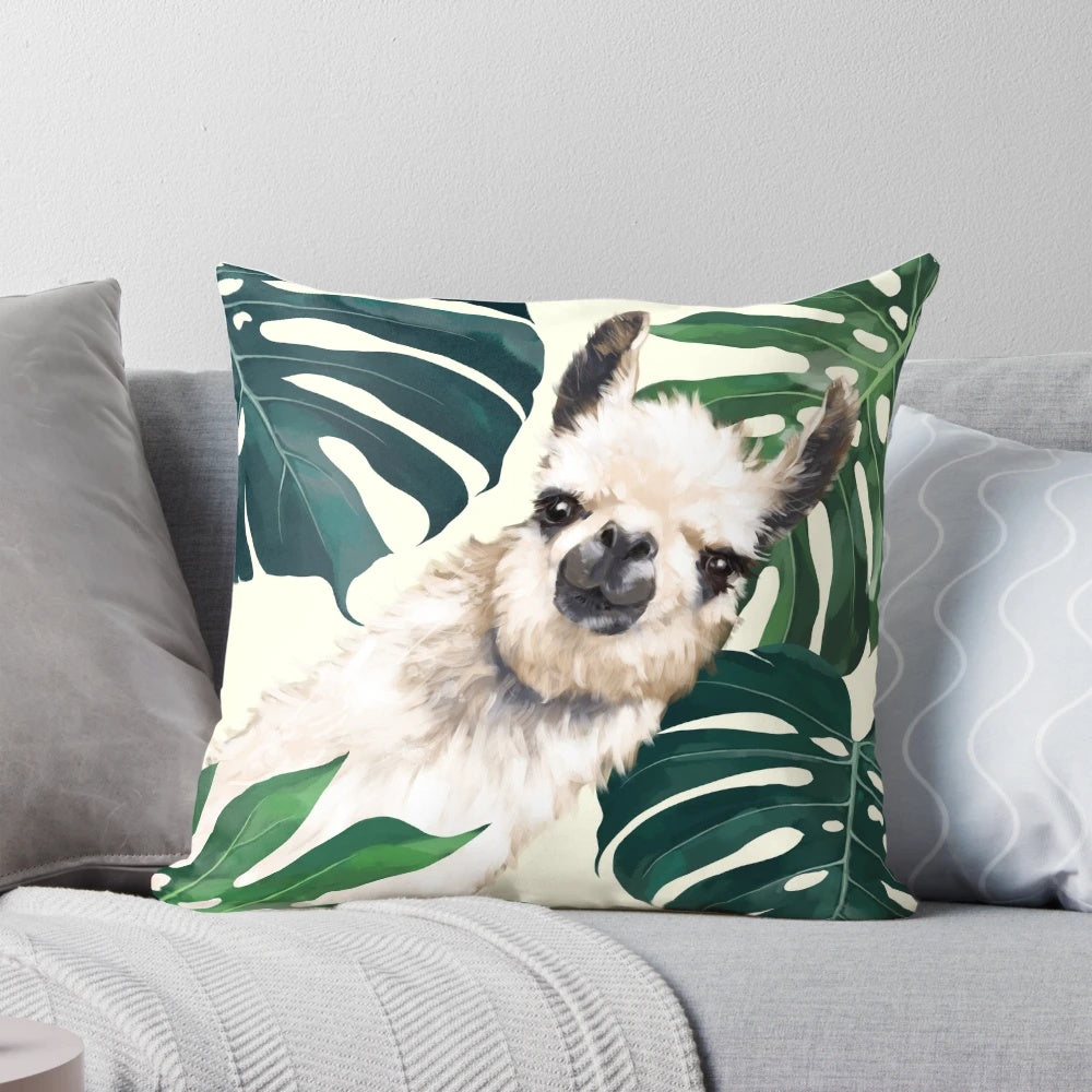 A plush, square accent pillow featuring a tropical monstera leaf design and a playful llama meme print.