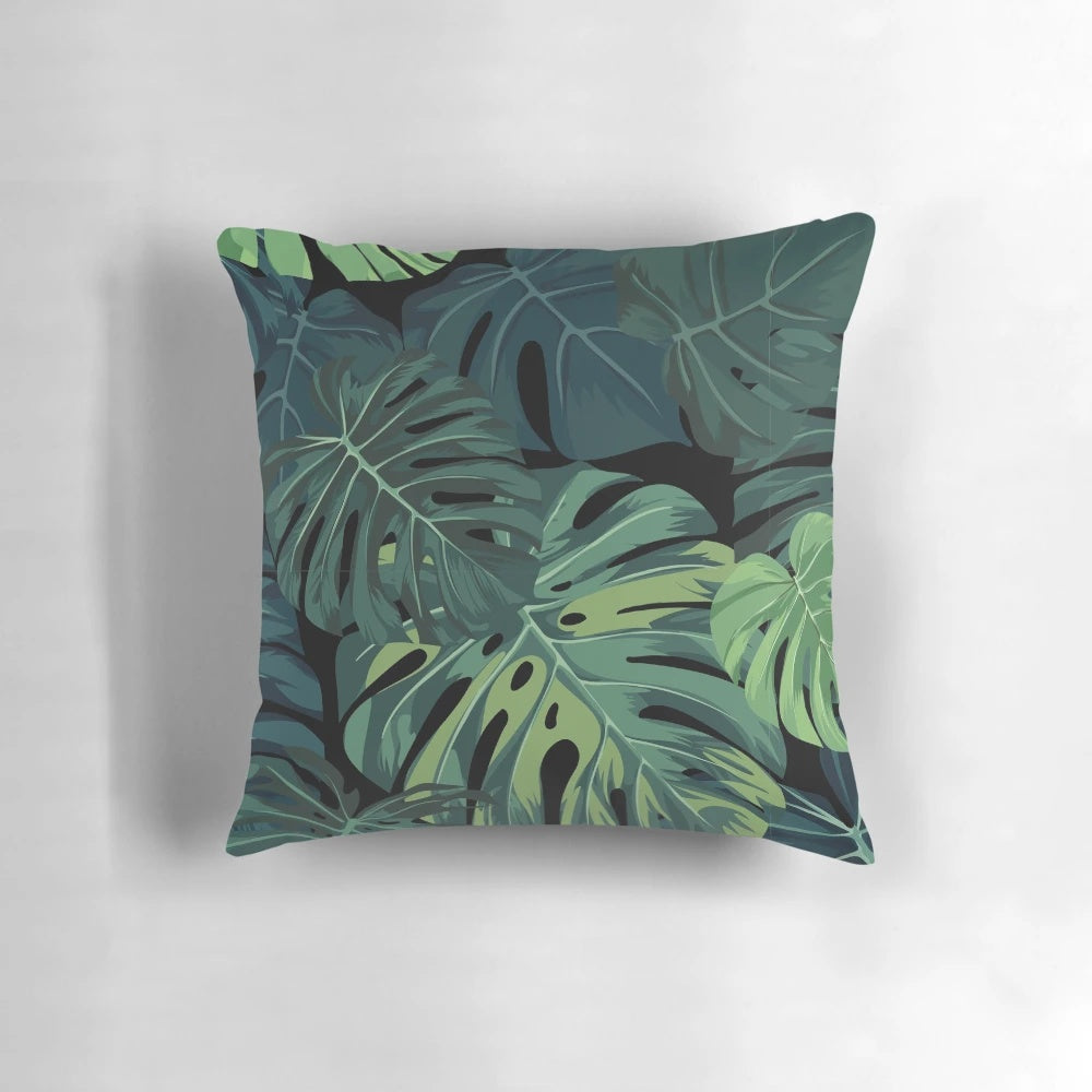 Tropical Monstera leaf pattern printed on a soft, decorative pillow