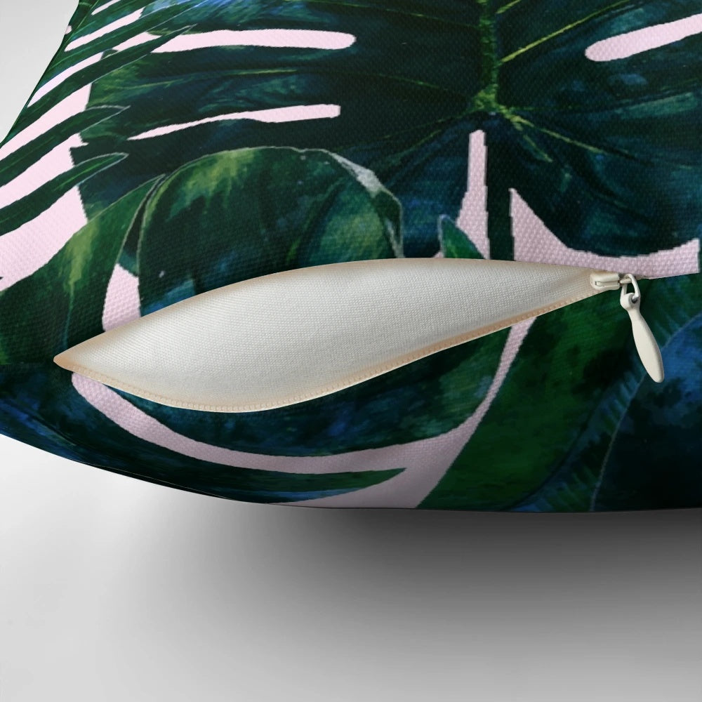 Tropical botanical plants painting featuring palm, monstera, and banana leaves in a lush jungle setting, printed on a decorative pillow.