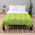 Orange bird plush blanket with a tropical floral background