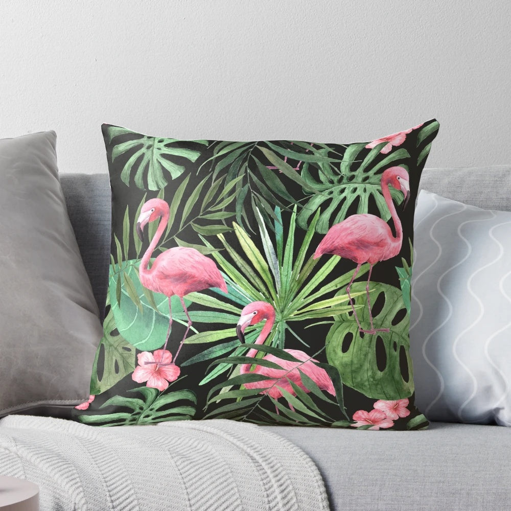 Decorative pillow with a tropical palm leaves and flamingo pattern design