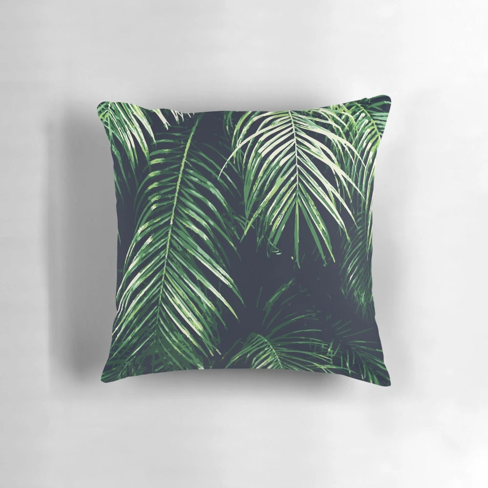 Tropical palm leaves pillow with watercolor freehand design