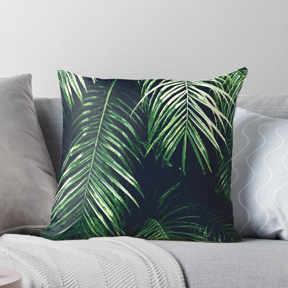 Tropical palm leaves pillow with watercolor freehand design