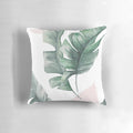 Tropical palm leaves watercolor design on a pillow cover