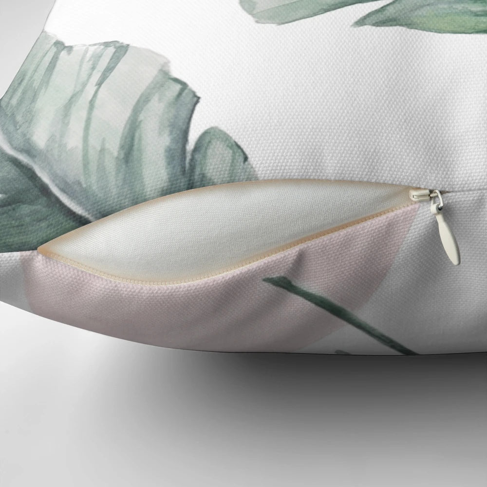 Tropical palm leaves watercolor design on a pillow cover