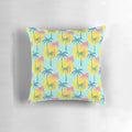 Retro tropical palm tree pattern pillow with blue, pink, and yellow colors