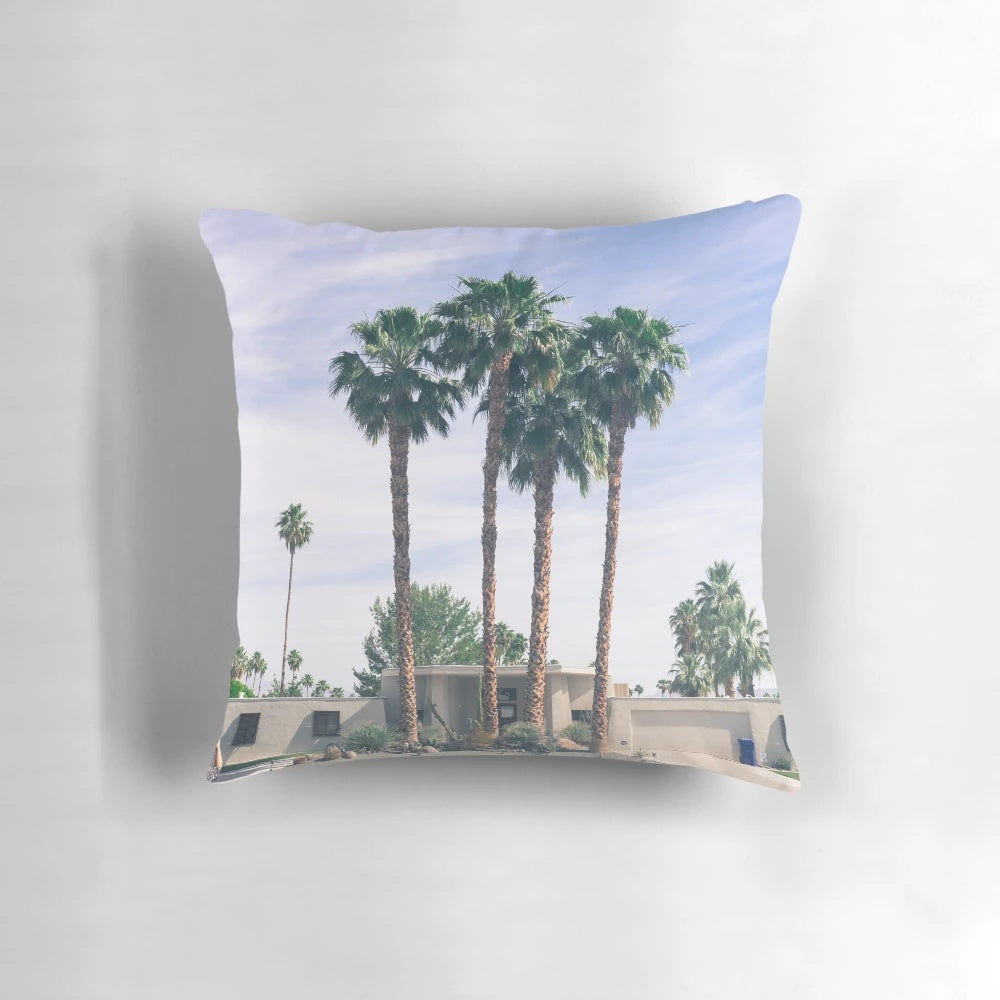 Vibrant palm tree pattern on a plush, high-quality pillow for your home or outdoor space.