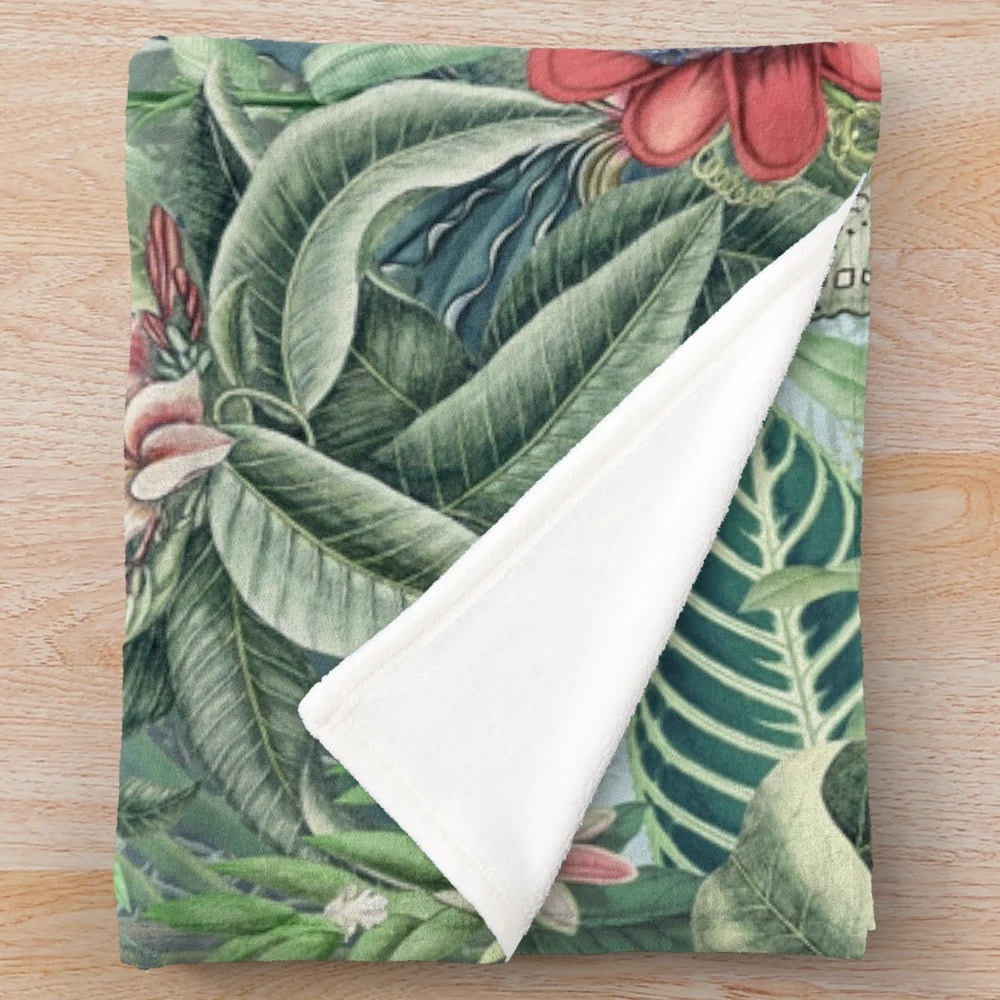 Tropical paradise plush blanket with vibrant floral and botanical design