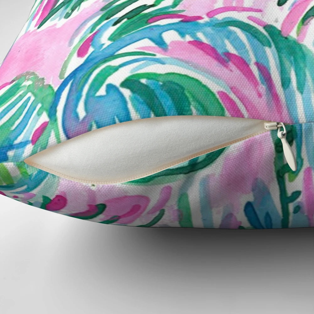 Decorative throw pillow with a tropical pink palm tree design inspired by Lilly Pulitzer's signature style
