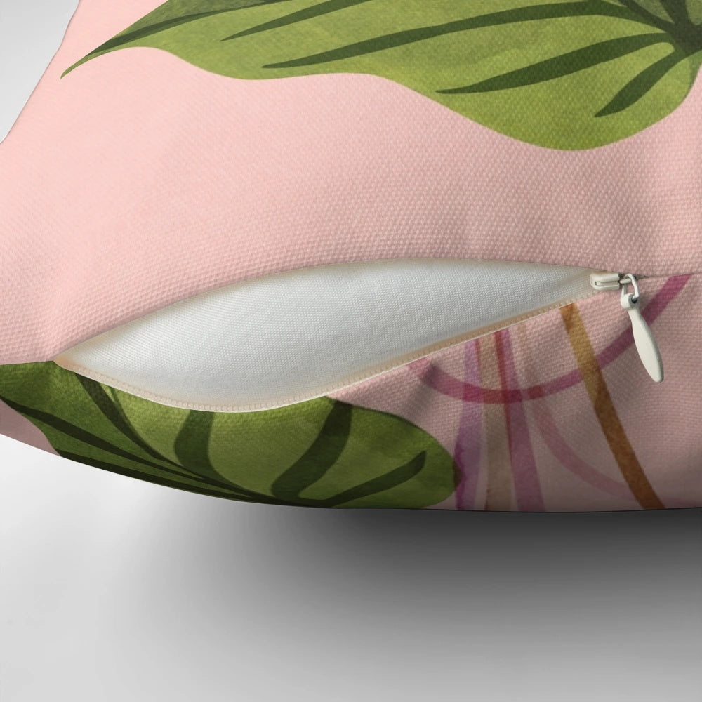 Tropical plant pillow with lush pink and green botanical leaves, perfect for mid-century or whimsical home decor