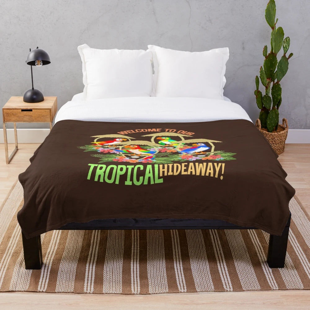 Tropical plush blanket with tiki motifs and palm trees