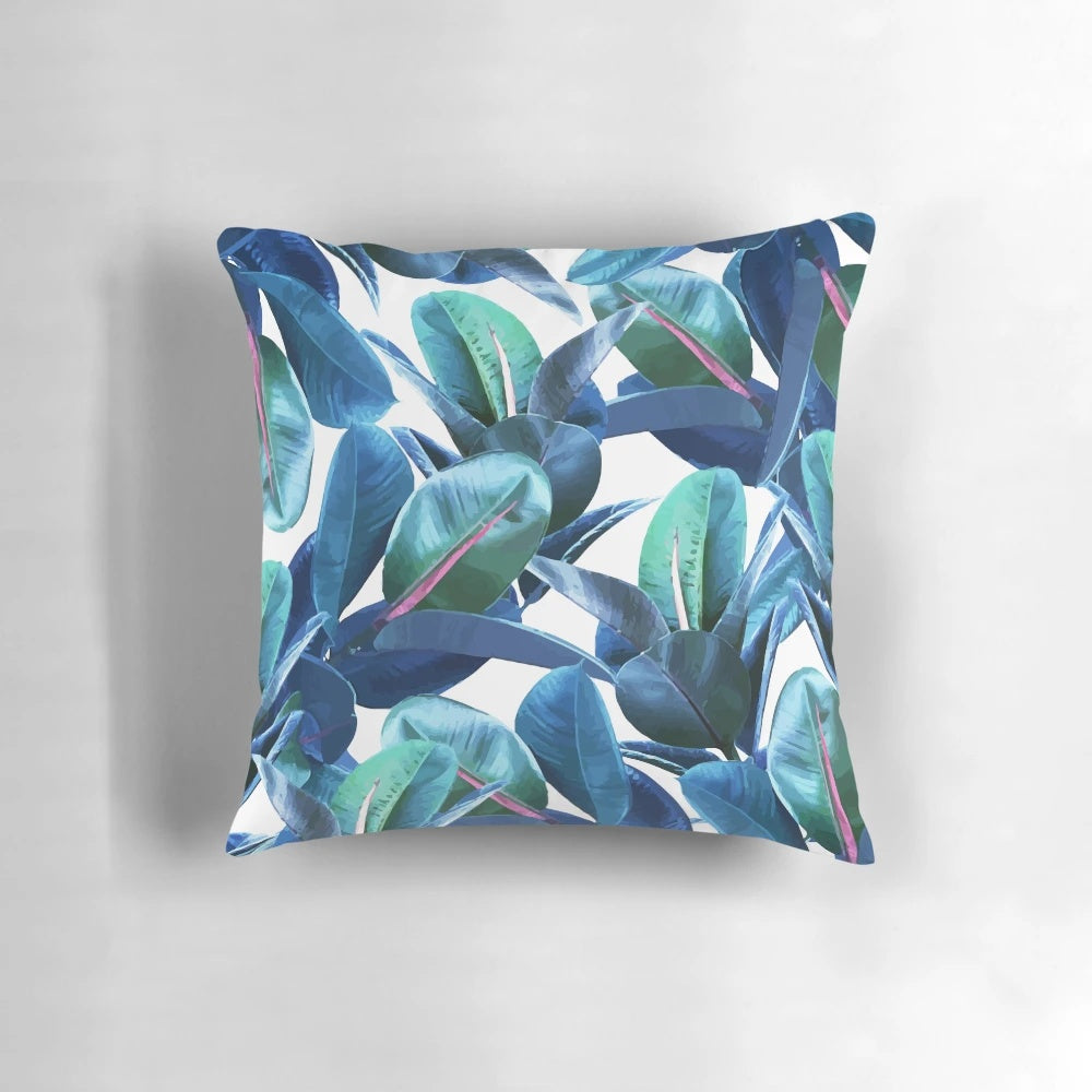 A vibrant tropical rubber plant pattern featured on a cozy decorative pillow.