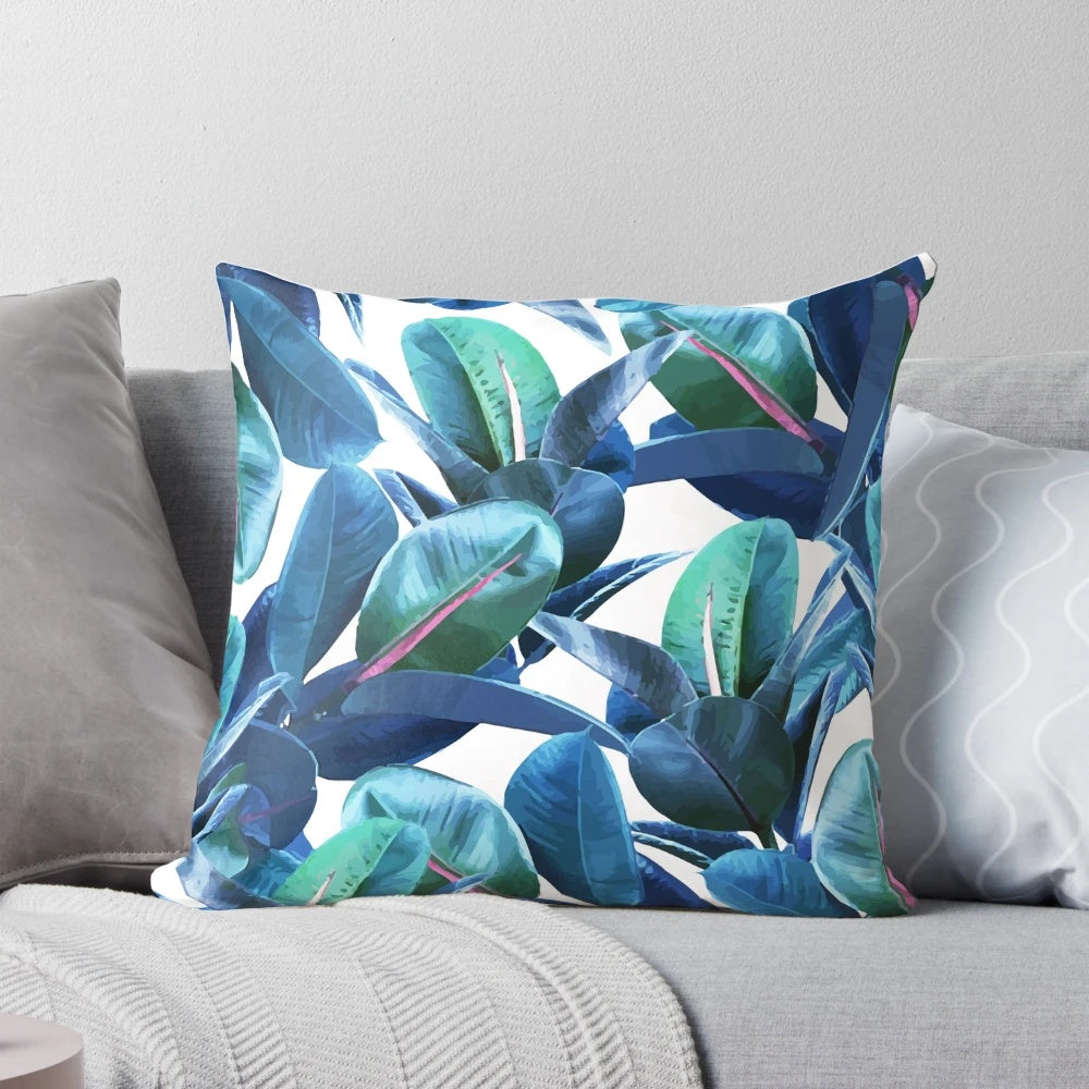 A vibrant tropical rubber plant pattern featured on a cozy decorative pillow.