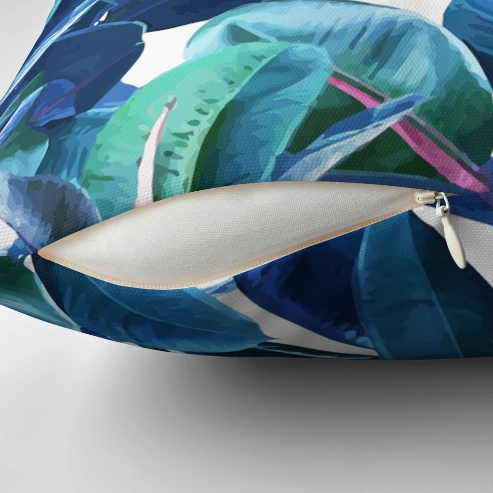 A vibrant tropical rubber plant pattern featured on a cozy decorative pillow.