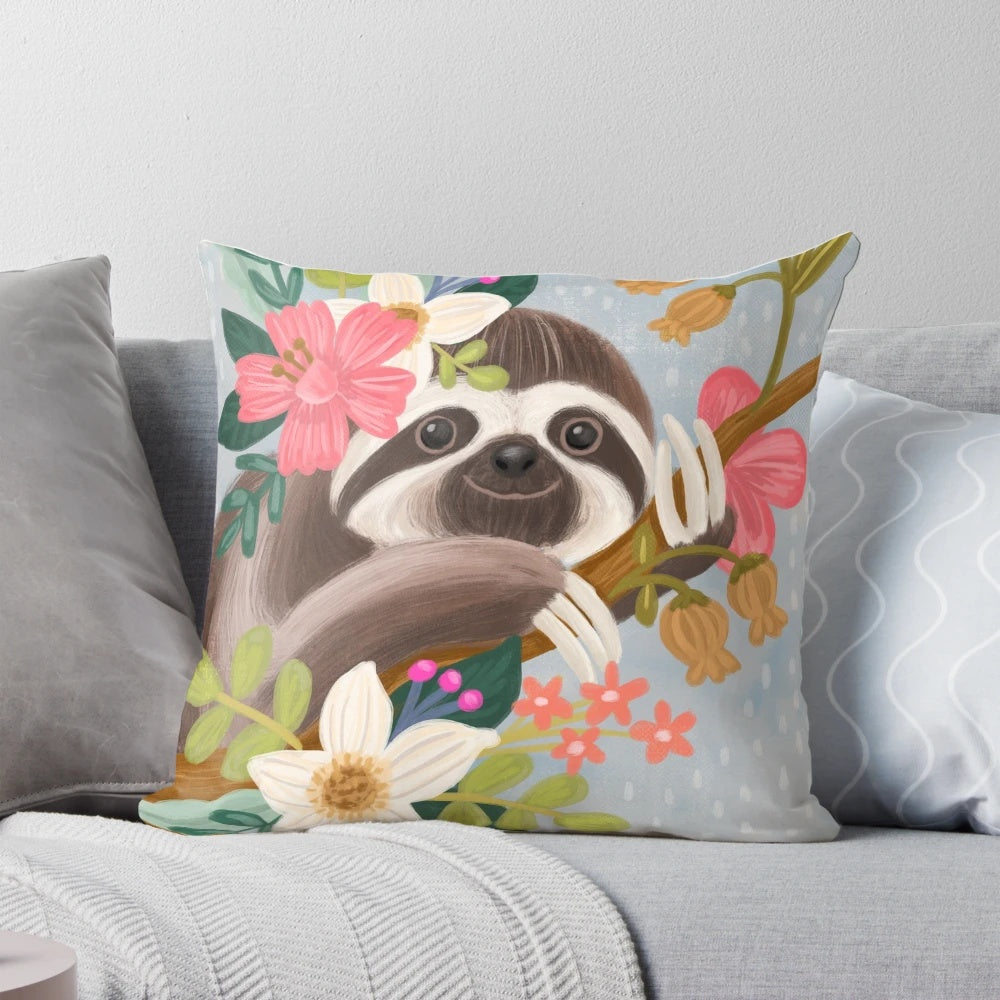 A soft, cuddly sloth pillow with a tropical floral pattern, perfect for adding a touch of nature-inspired charm to your home.