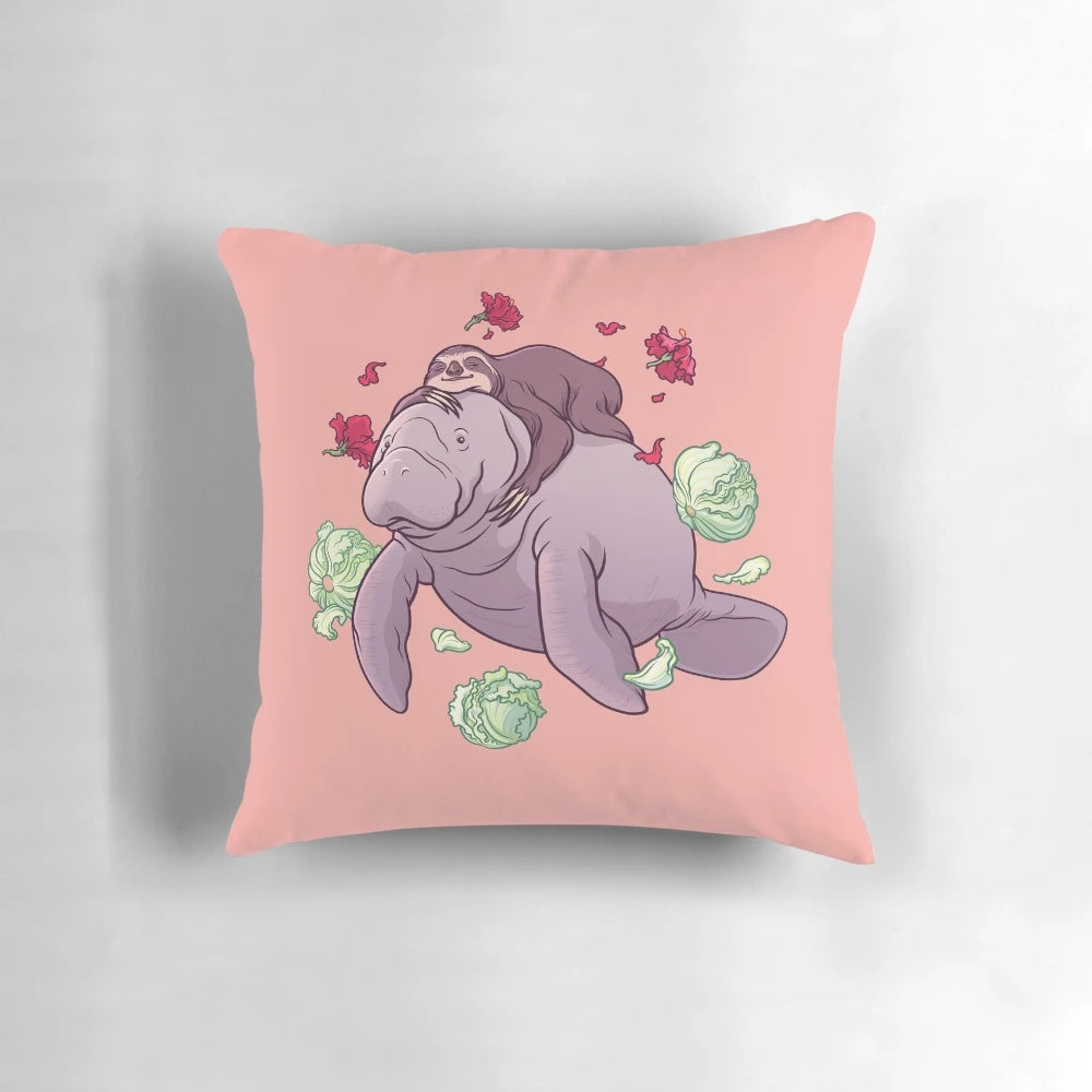 Tropical-themed decorative pillow featuring a manatee, sloth, and hibiscus flower design