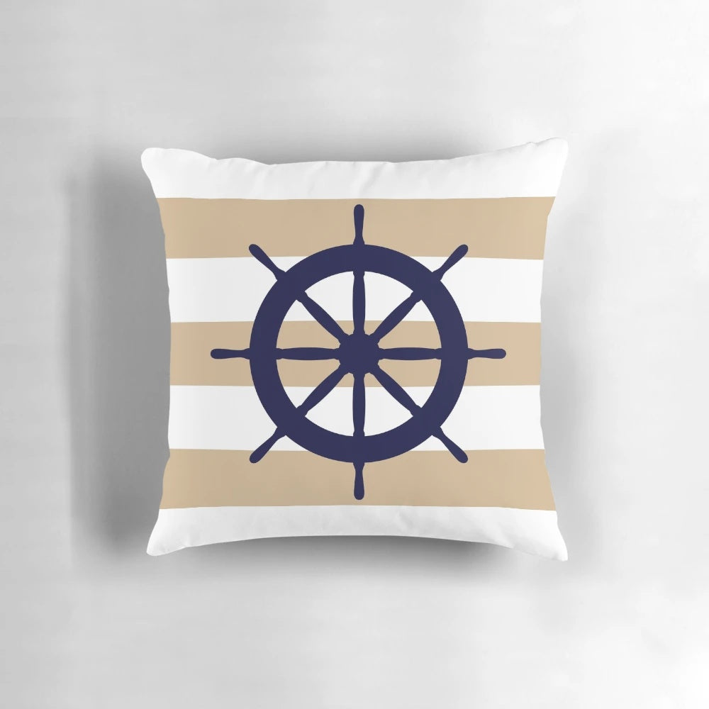 Tropical blue and white striped pillow with a ship's steering wheel design