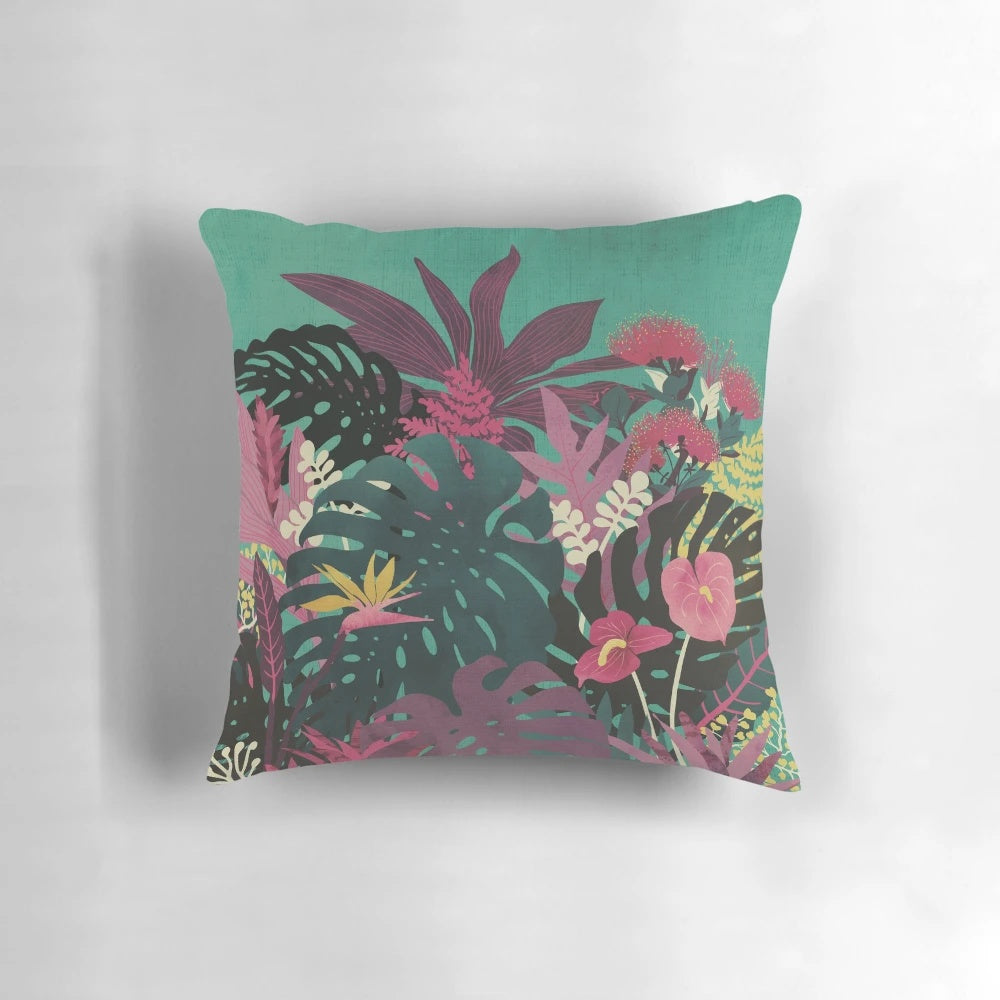 Tropical-inspired pillow with vibrant floral and leaf patterns, perfect for summer vacations and beach getaways.