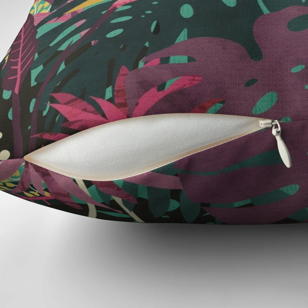 Tropical-inspired pillow with vibrant floral and leaf patterns, perfect for summer vacations and beach getaways.