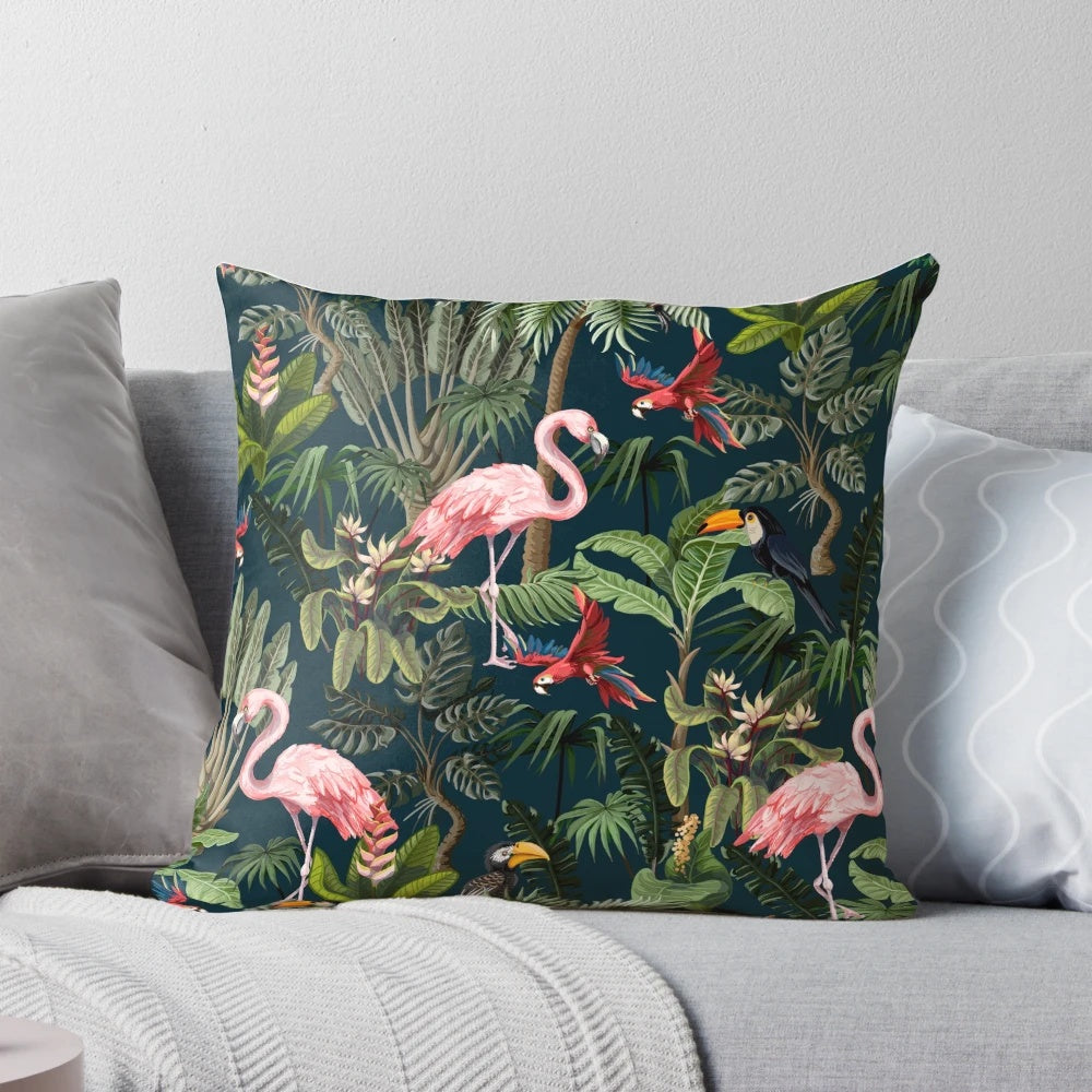 Tropical throw pillow featuring a colorful pattern with a toucan, flamingo, and parrot against a jungle background.