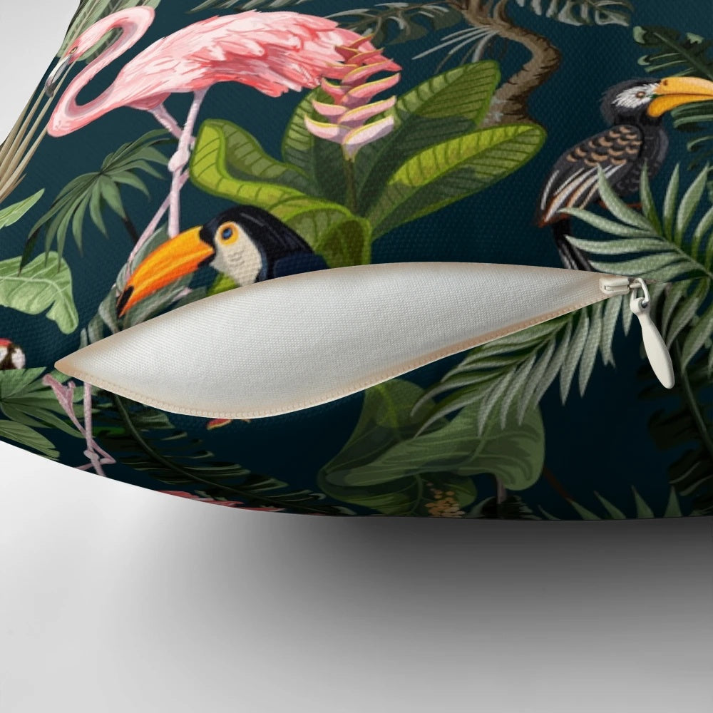 Tropical throw pillow featuring a colorful pattern with a toucan, flamingo, and parrot against a jungle background.