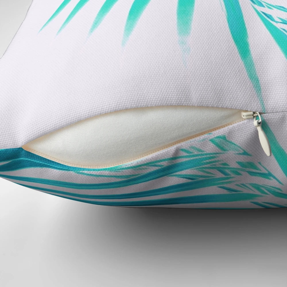 A decorative pillow featuring a digital artwork of tropical palm leaves in shades of turquoise, perfect for adding a summer vibe to any coastal or beach-inspired space.