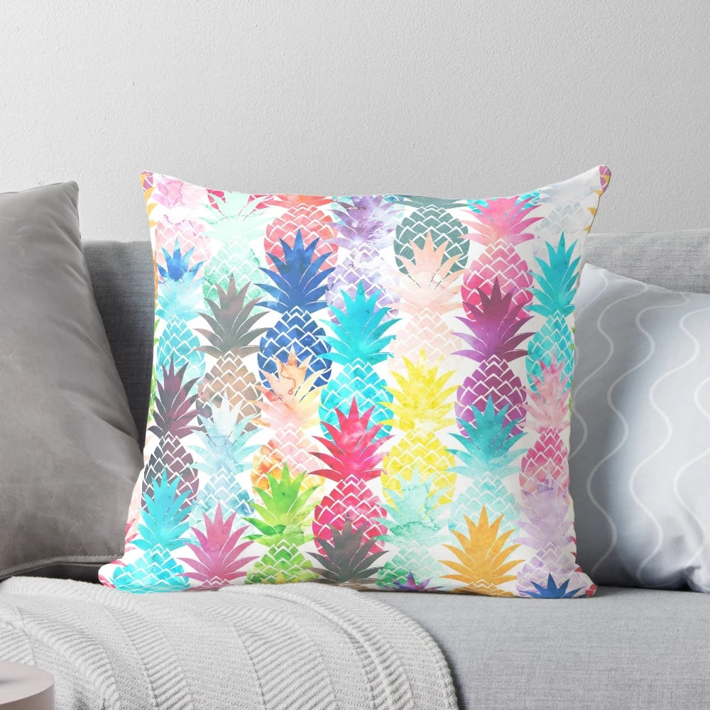 Vibrant tropical watercolor pineapple pattern printed on a soft, plush pillow.