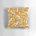 Vibrant yellow banana-shaped pillow for a tropical, summer-inspired home decor