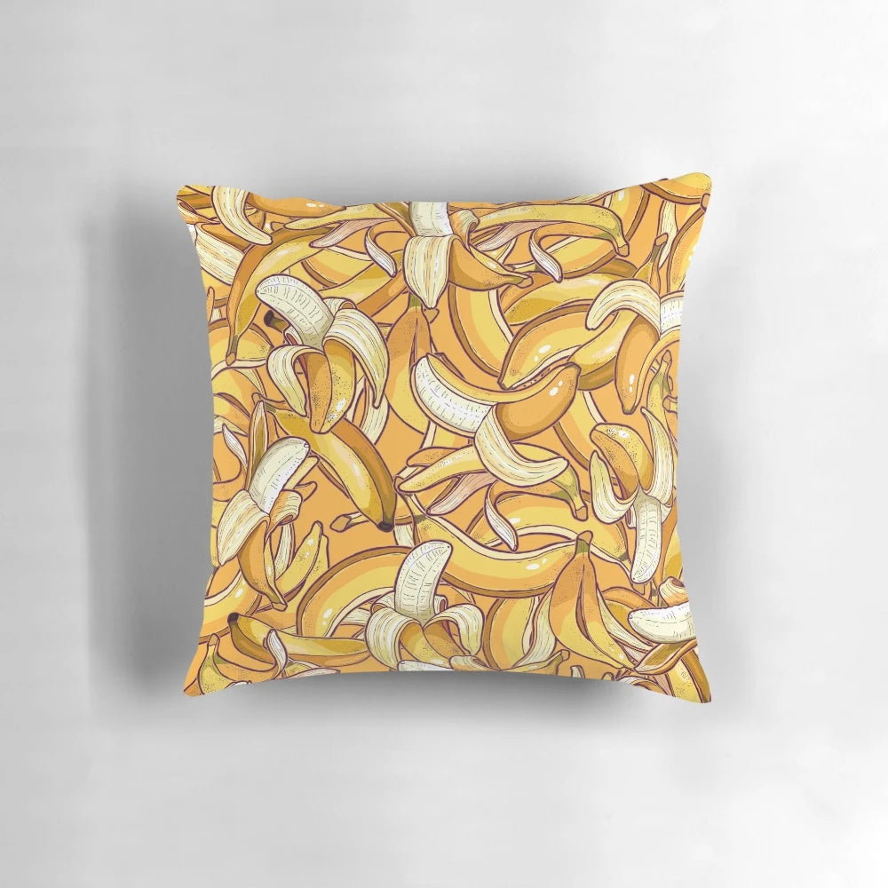 Vibrant yellow banana-shaped pillow for a tropical, summer-inspired home decor