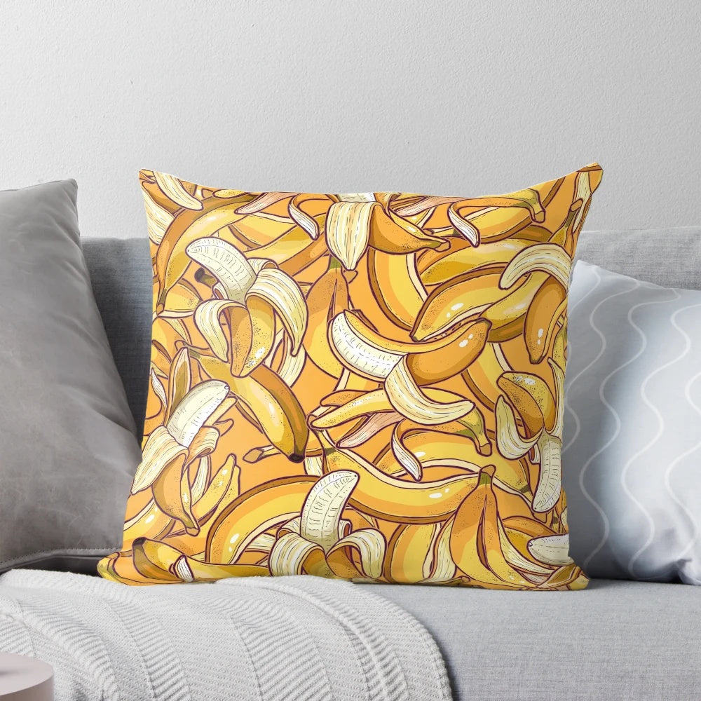 Vibrant yellow banana-shaped pillow for a tropical, summer-inspired home decor
