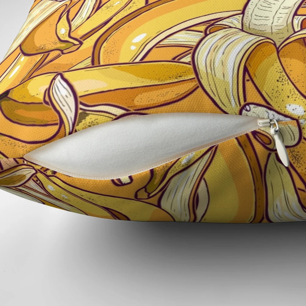 Vibrant yellow banana-shaped pillow for a tropical, summer-inspired home decor