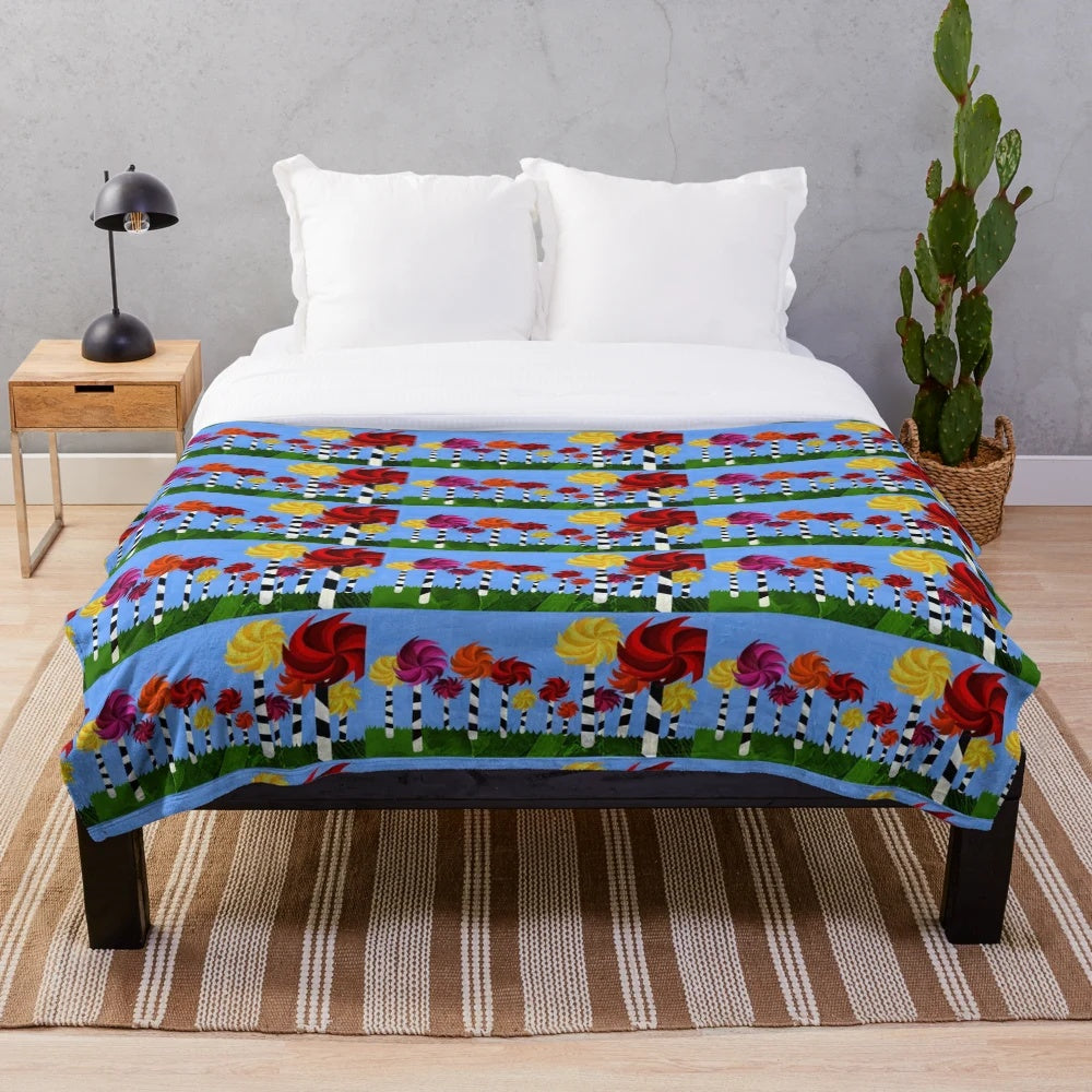 Dr. Seuss Truffula Forest inspired plush blanket with collage art design