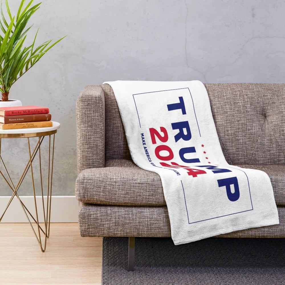 Trump-inspired plush blanket featuring the 45th president's name and branding