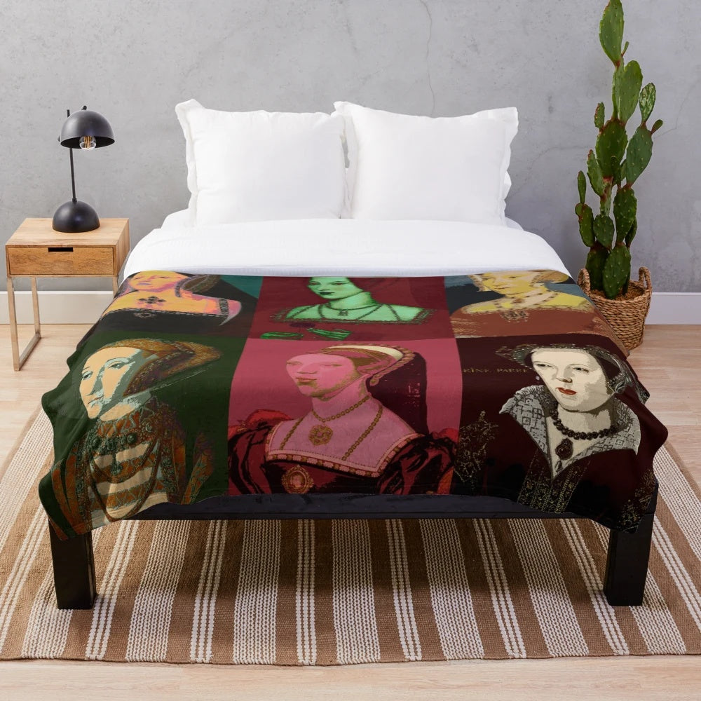 Plush blanket featuring graphic design of the six wives of Henry VIII