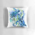 Turquoise blue pillow with a vibrant sea turtle design