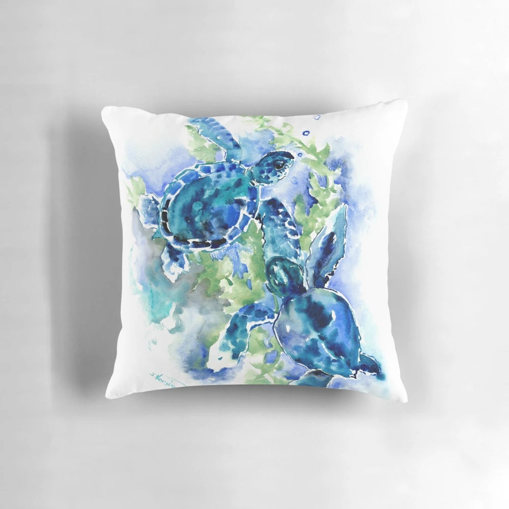 Turquoise blue pillow with a vibrant sea turtle design