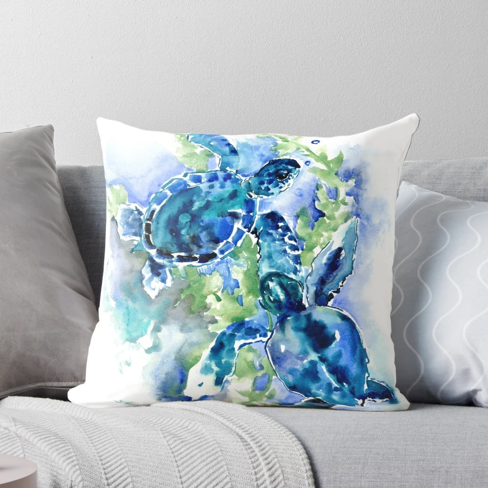 Turquoise blue pillow with a vibrant sea turtle design