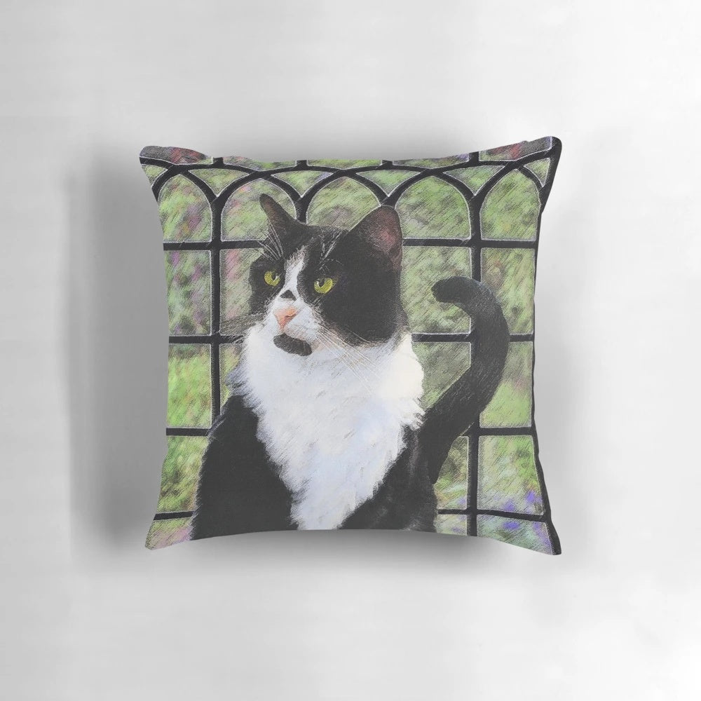 A high-quality decorative pillow featuring a beautiful portrait of a tuxedo cat.