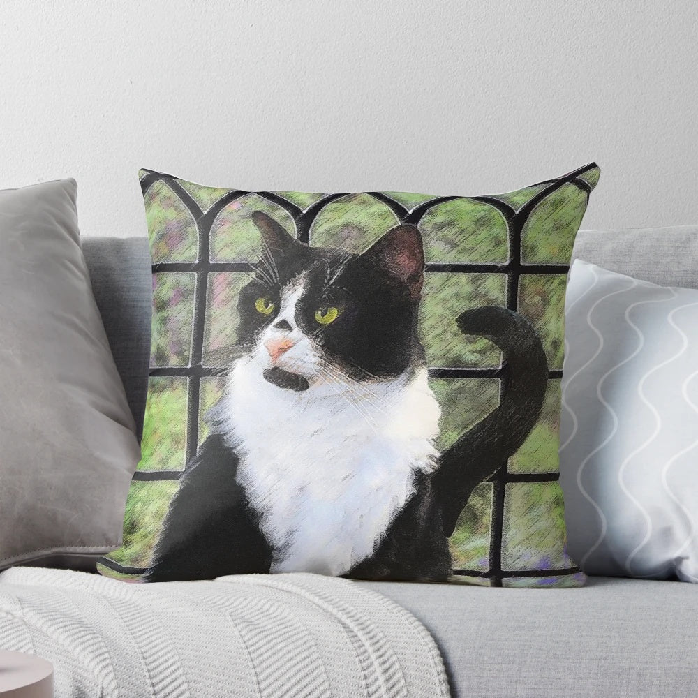 A high-quality decorative pillow featuring a beautiful portrait of a tuxedo cat.