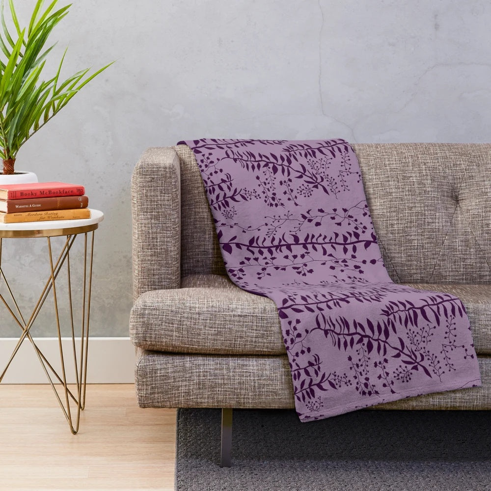 Twilight-inspired plush blanket featuring a lavender and purple floral design based on Bella Swan's character