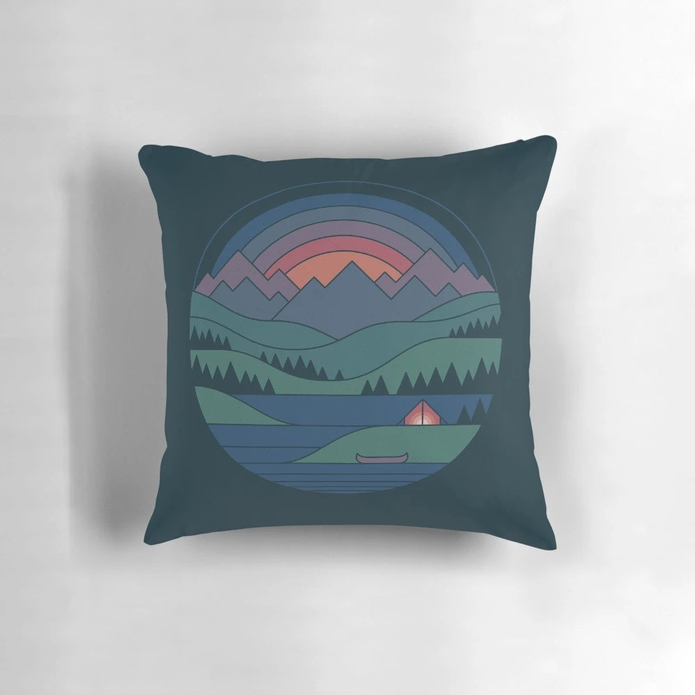 Twilight landscape pillow featuring a minimalist design of a lake and mountains at dusk