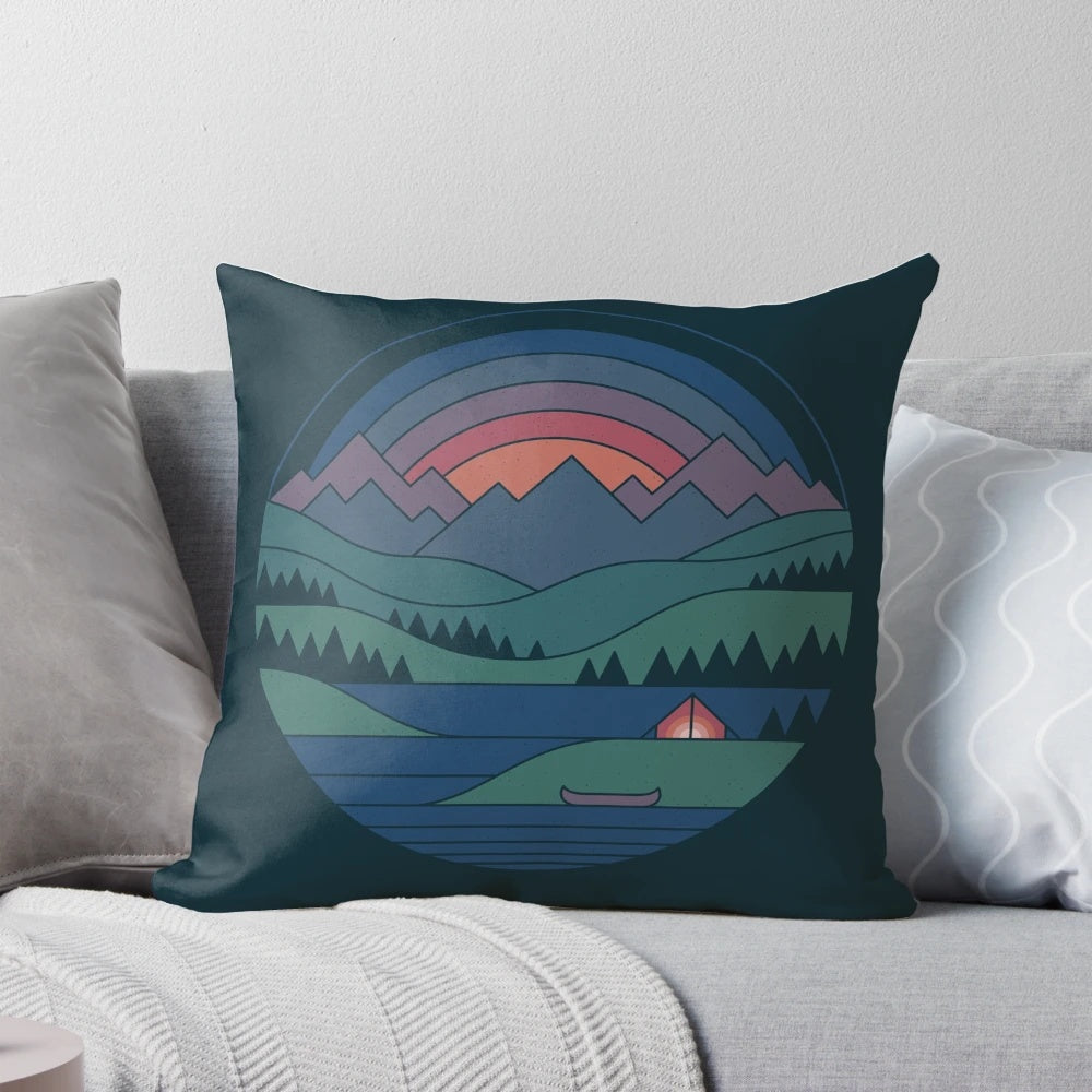 Twilight landscape pillow featuring a minimalist design of a lake and mountains at dusk