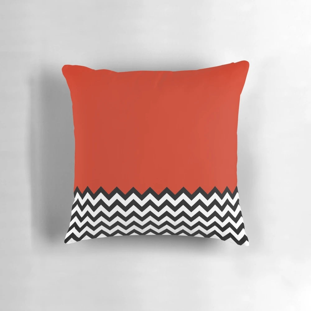 A black, white, and red graphic pillow inspired by the iconic Black Lodge from the TV series Twin Peaks.